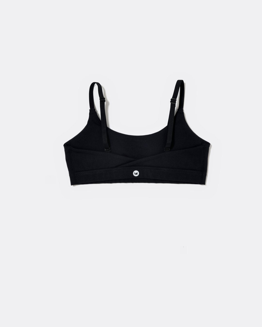 SASSH Active Bralette in Black, back view showing crossback strap detail with logo
