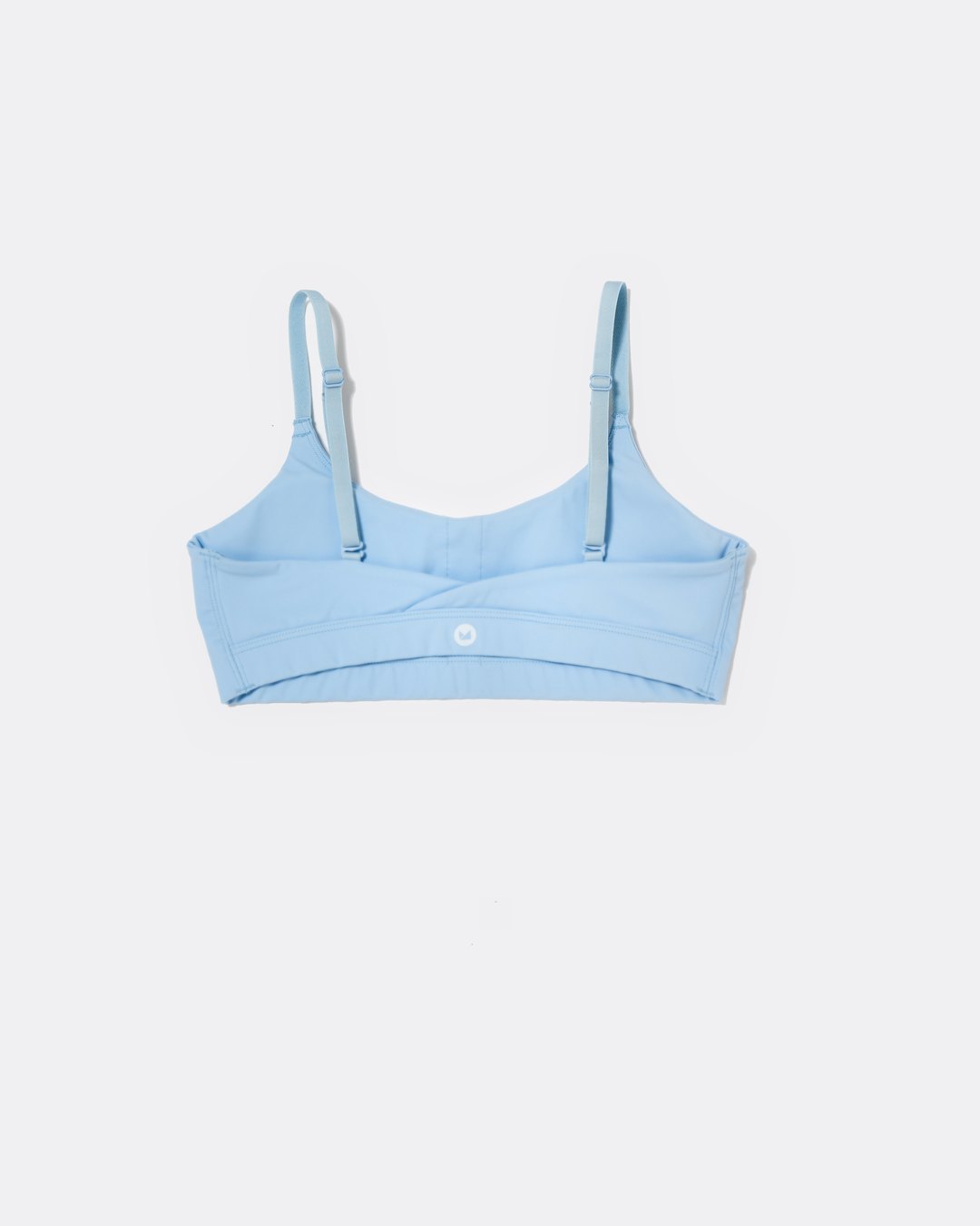 SASSH Active Bralette in Blue, back view showing crossback strap detail with logo