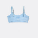 SASSH Active Bralette in Blue, back view showing crossback strap detail with logo