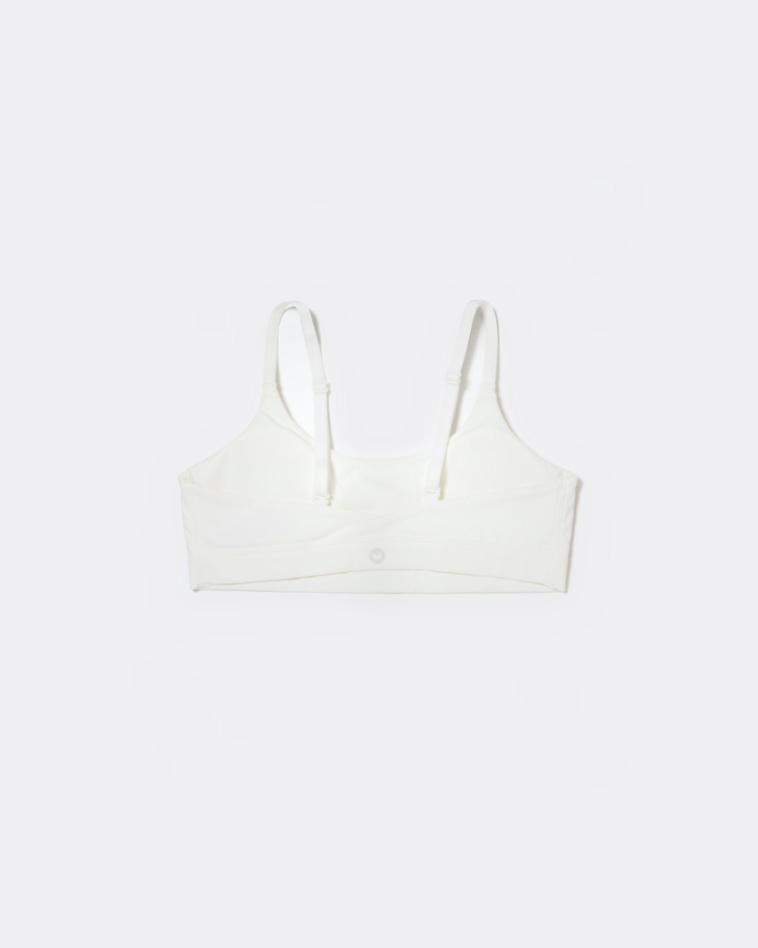 SASSH Active Bralette in White, back view showing crossback strap detail with logo