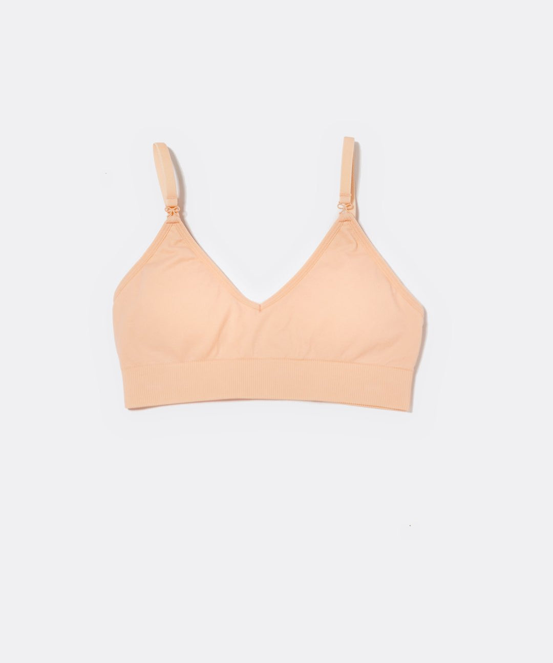 SASSH Essential Bralette in Peach, front view, V-neck triangle style with ribbed underband and bow strap detail