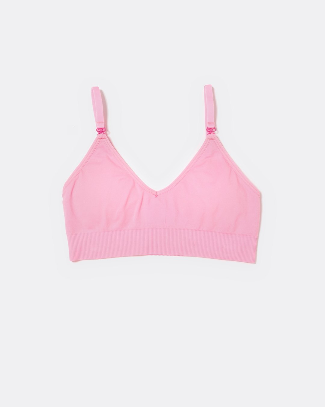 SASSH Essential Bralette in Pink, front view, V-neck triangle style with ribbed underband and bow strap detail