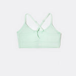 SASSH The Energy sports bra in mint green, back ghost view, showing crossover racerback strap detail — girls sports bra, first sports bra.