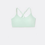 SASSH The Energy sports bra in mint green, front ghost view, smooth scoop neckline and seamless underband — girls sports bra for tweens.