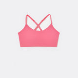 SASSH The Energy sports bra in hot pink, front ghost view, smooth scoop neckline and seamless underband — girls sports bra for tweens.