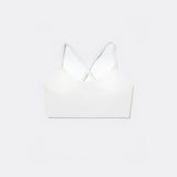 SASSH The Energy sports bra in white, front ghost view, smooth scoop neckline and seamless underband — girls sports bra for tweens.