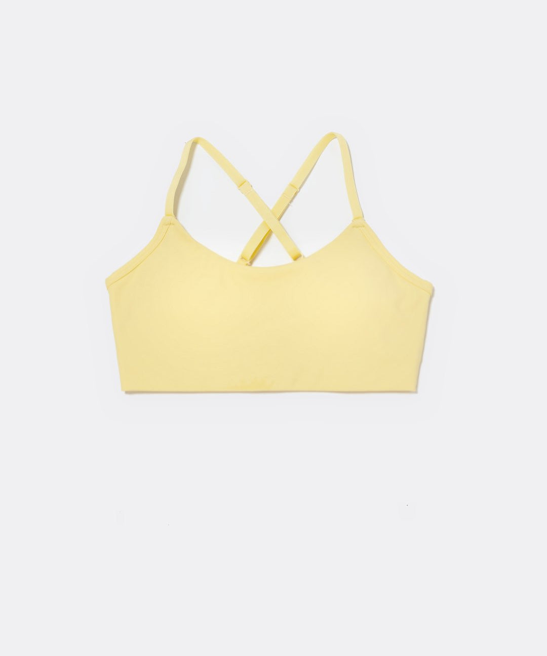 SASSH The Energy sports bra in yellow, front ghost view, smooth scoop neckline and seamless underband — girls sports bra for tweens.