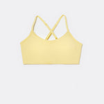 SASSH The Energy sports bra in yellow, front ghost view, smooth scoop neckline and seamless underband — girls sports bra for tweens.